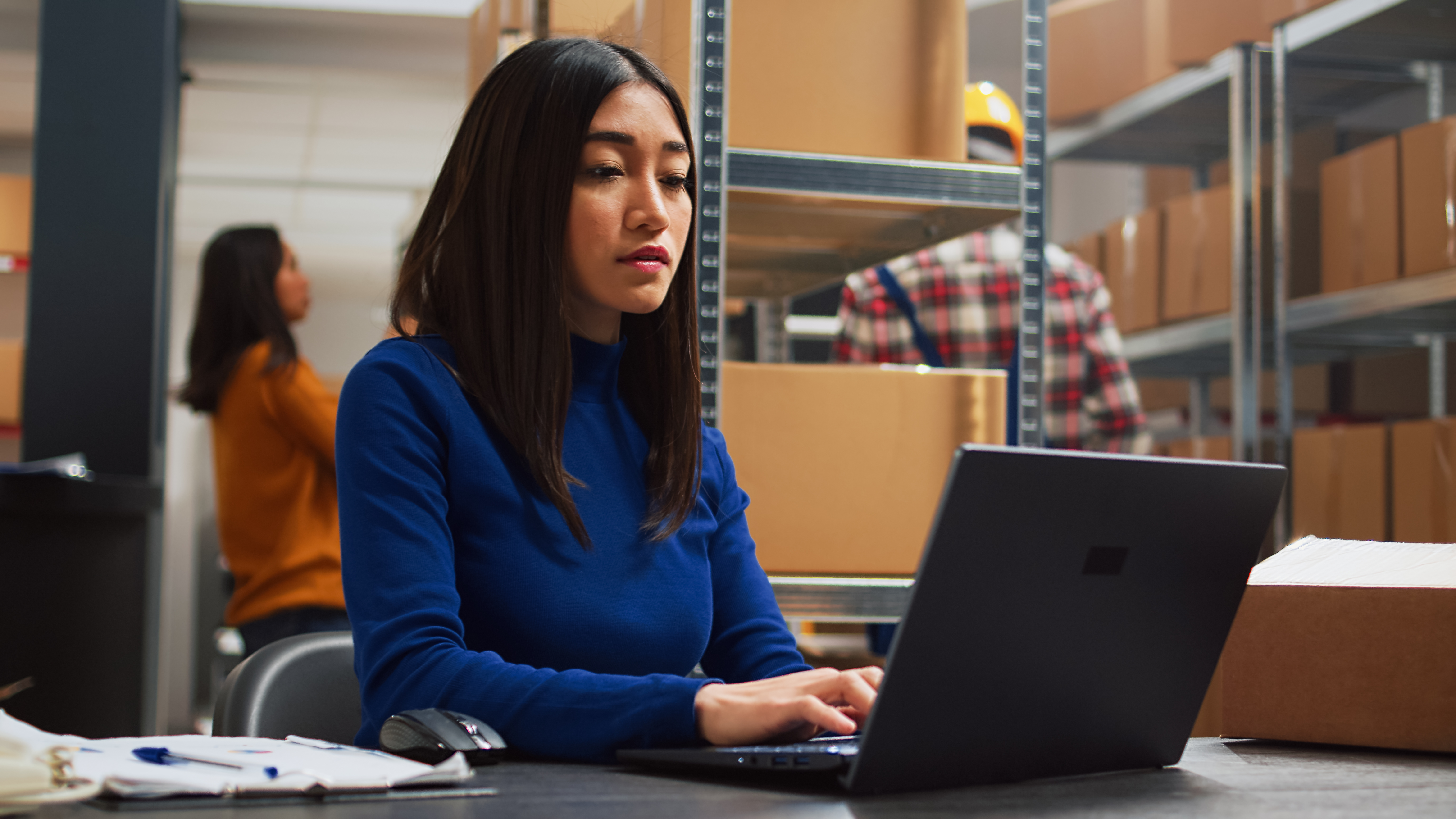 Female entrepreneur working on supply chain development